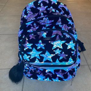 justice , regular size ( school backpack )